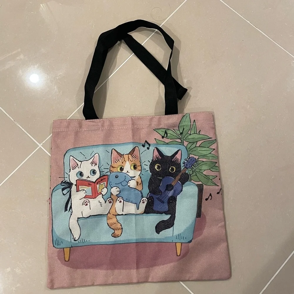 Cat-Themed Tote Bag with Black Handles‎